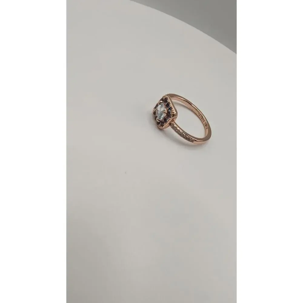 Rose Gold Plated Ring with Aquamarine and Clear Accent Stones Size 8